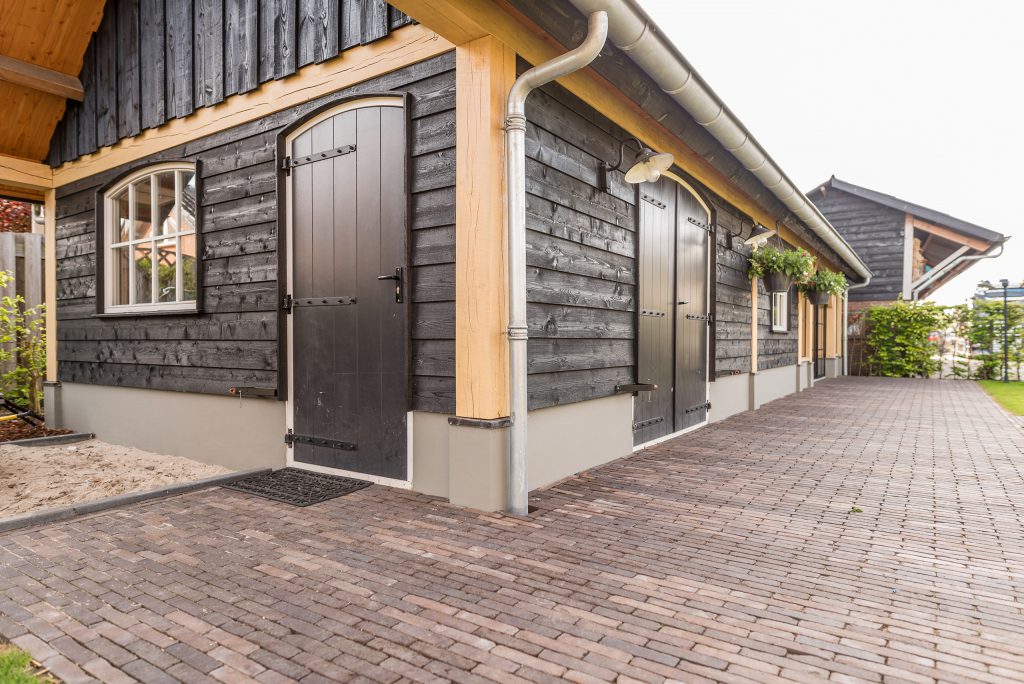 Maatwerk houten schuur gerealiseerd door Stantico