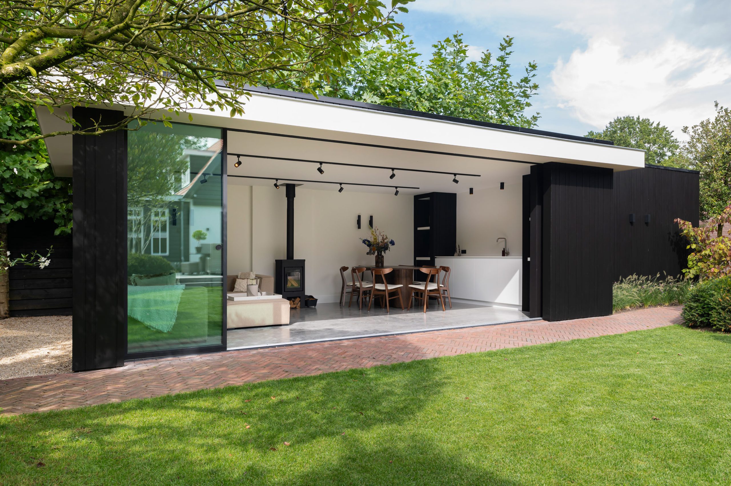 Deze luxe tuinkamer is een echte aanwinst voor de tuin.